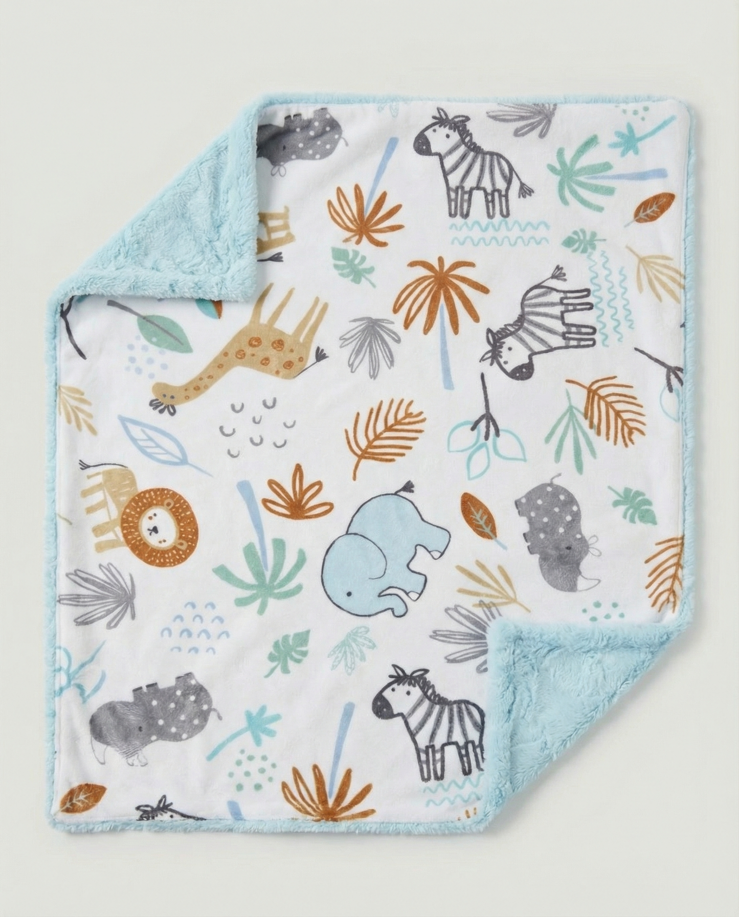 Baby blanket with animal and leaf pattern on a white background