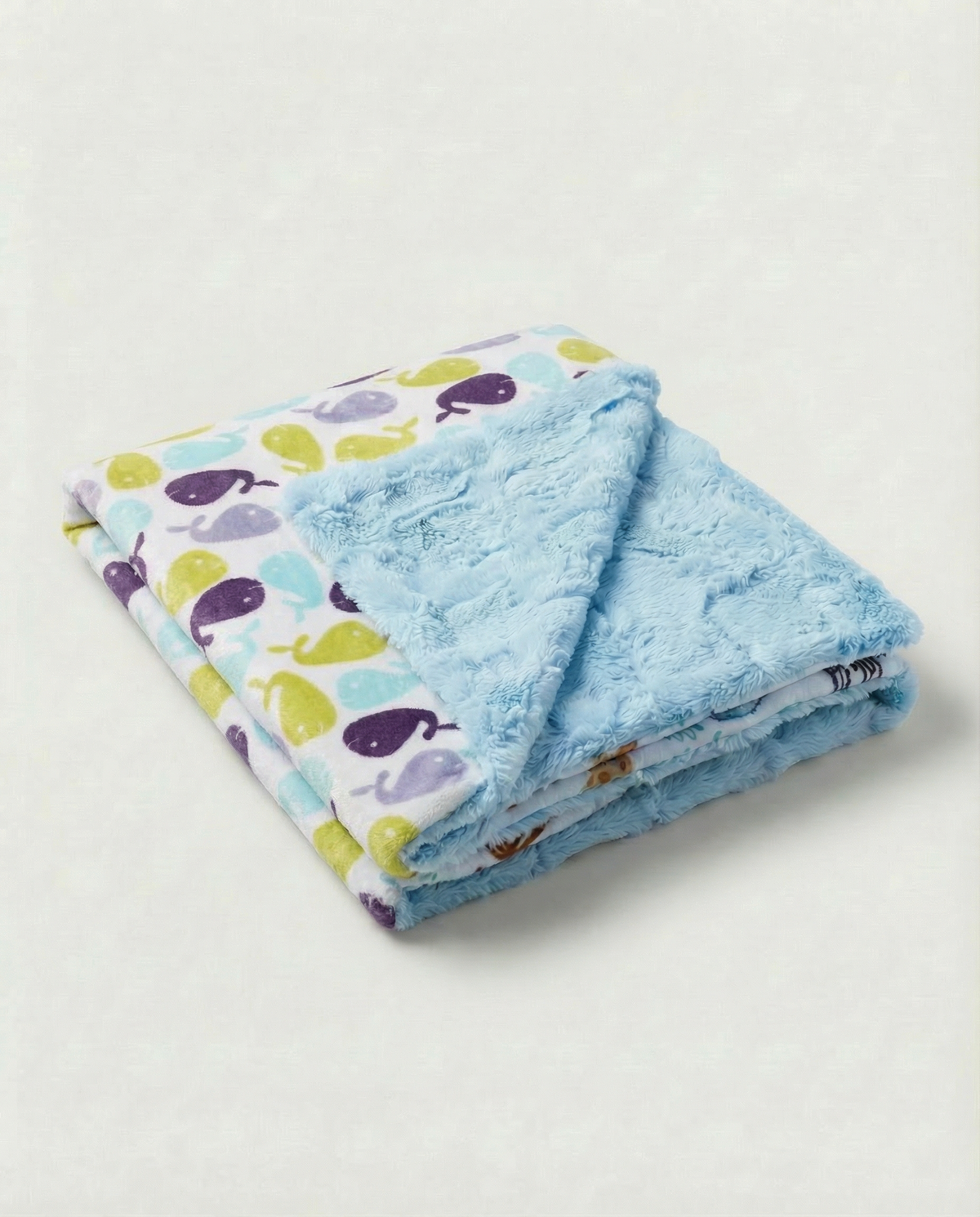 Baby blanket with whale print in blue