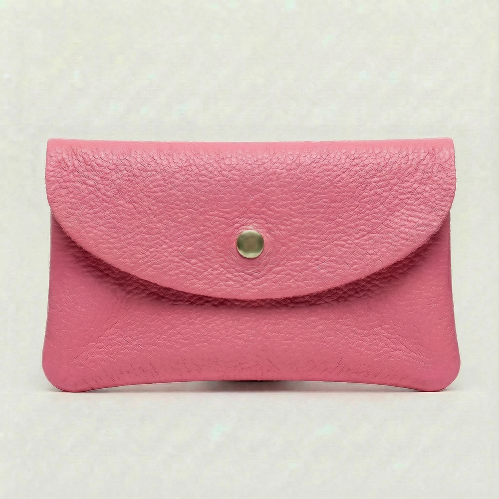 Barbie Pink pebble leather wallet collection featuring Mini Coin Wallet, Coin Wallet, and Cellphone Wallet in genuine leather, made in Italy.
