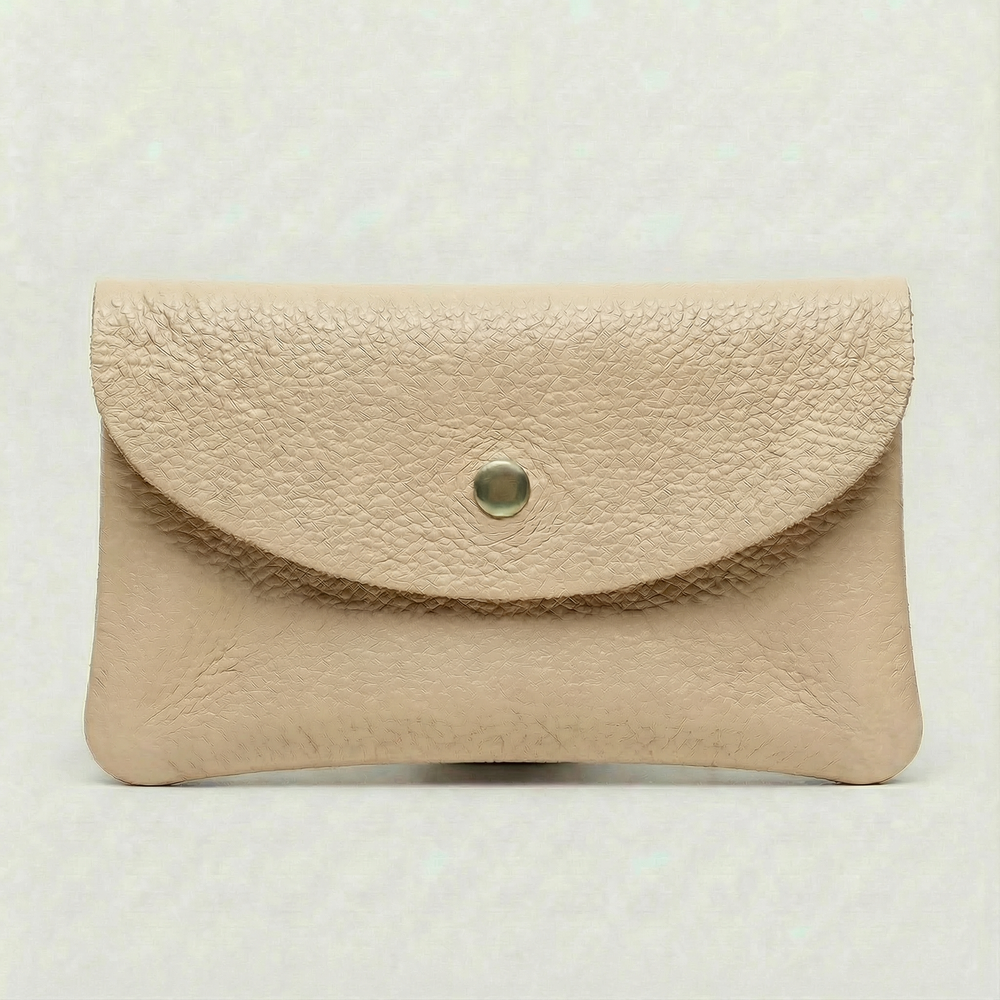 Beige pebble leather wallet collection featuring Mini Coin Wallet, Coin Wallet, and Cellphone Wallet in genuine leather, made in Italy.