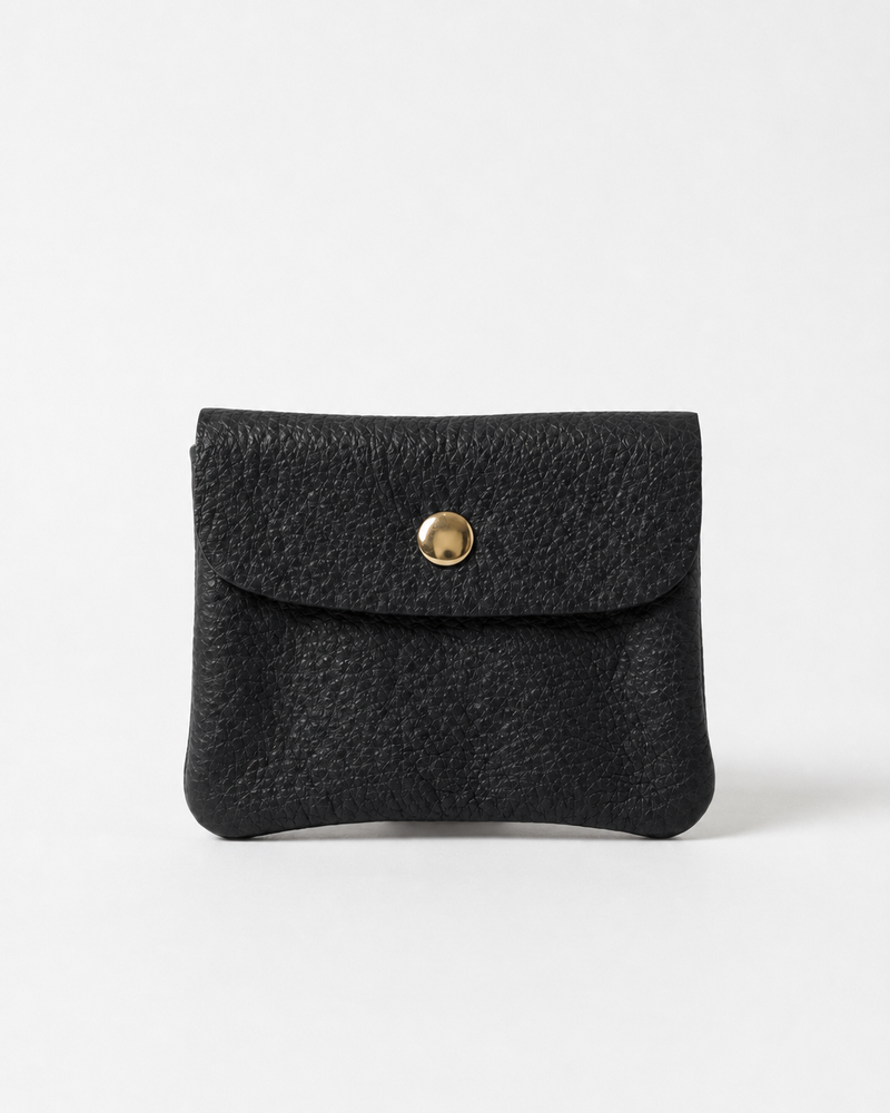 Black pebble leather mini coin wallet with snap closure, compact Italian-made design for coins and small essentials