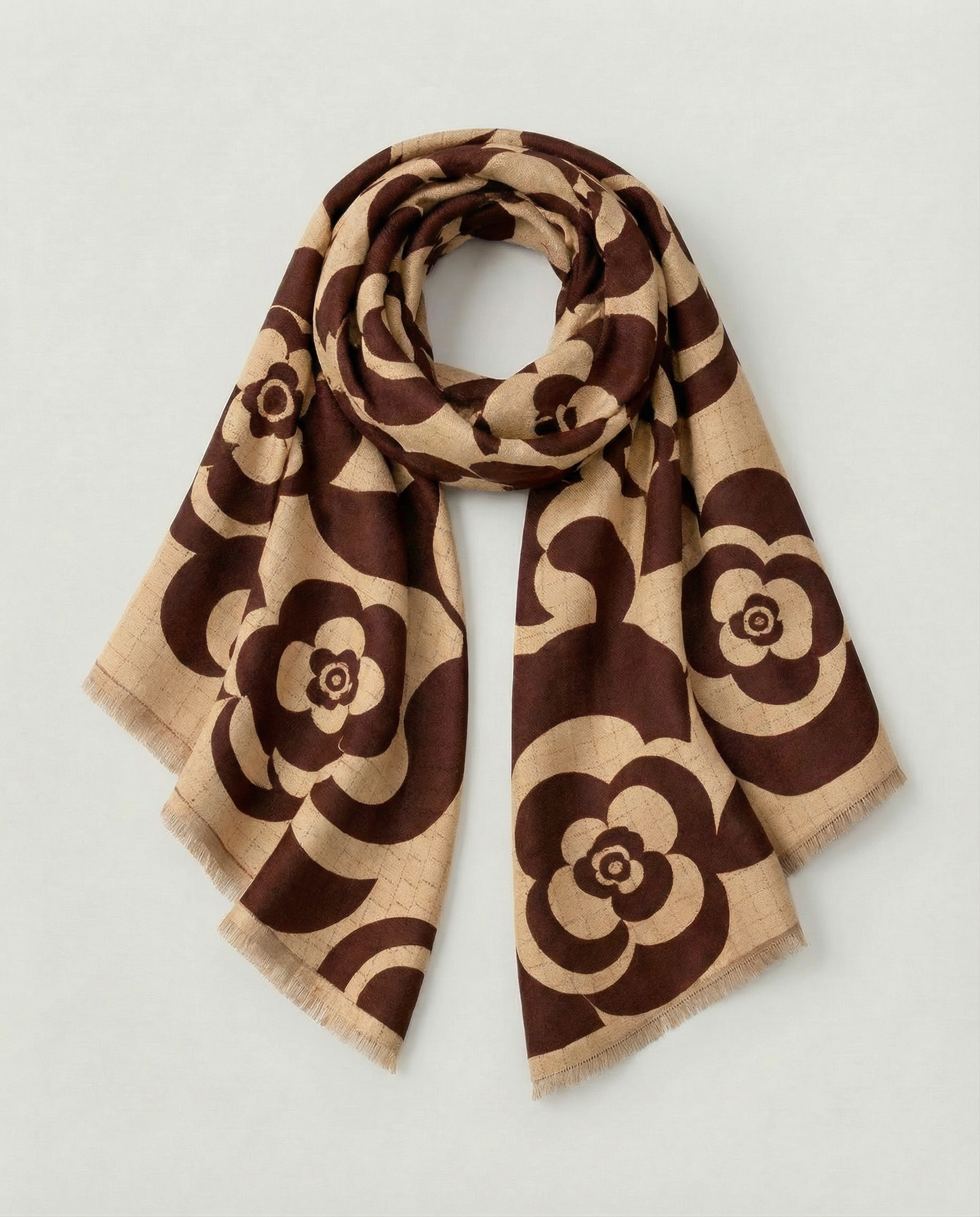 Brown and beige floral patterned wrap on a light gray background