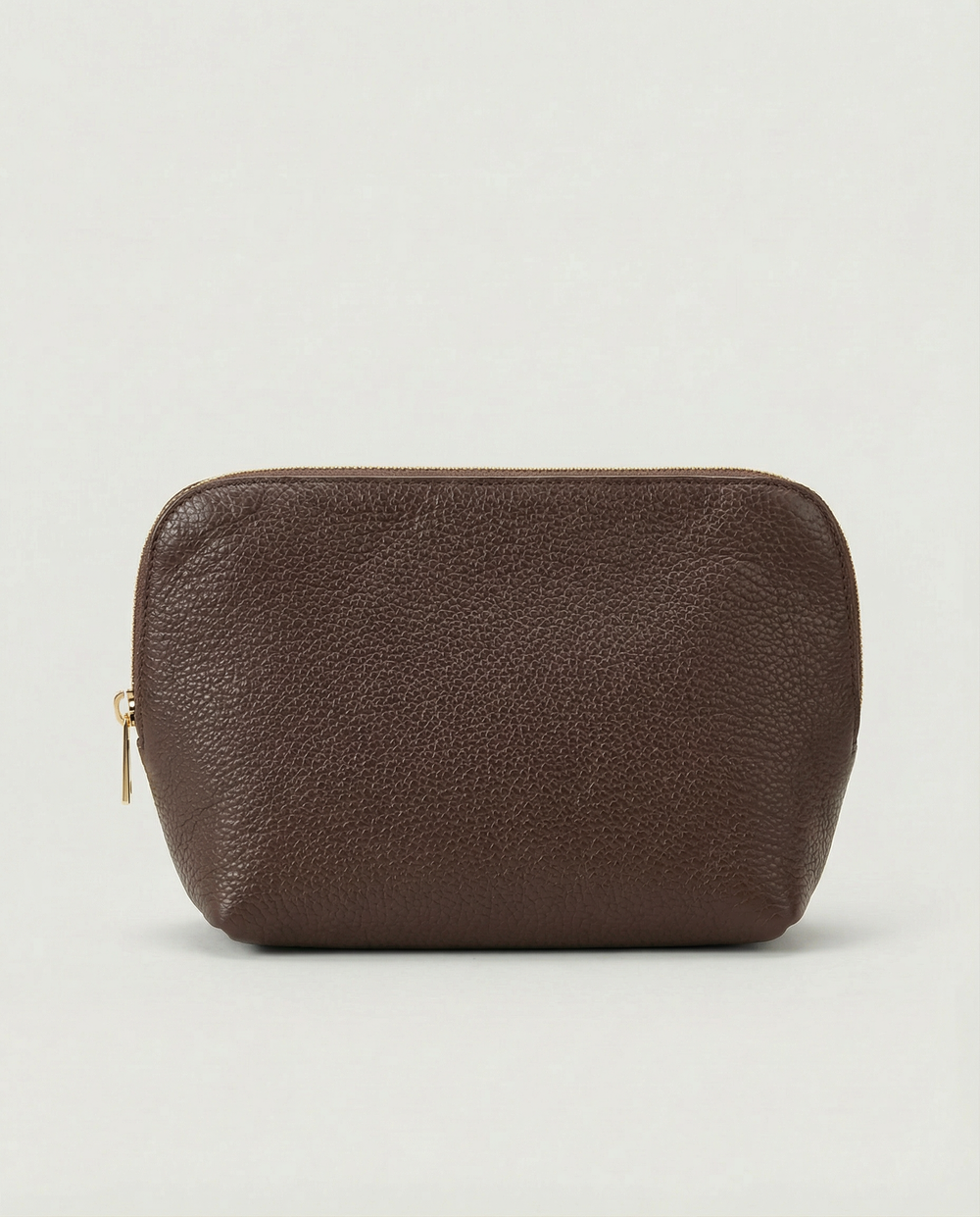Pebble leather cosmetic bag with zip closure, available in chocolate, structured silhouette for everyday essentials.
