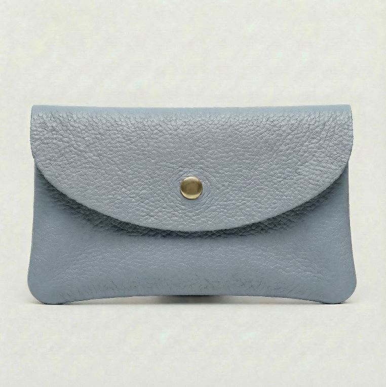 Corn Blue pebble leather wallet collection featuring Mini Coin Wallet, Coin Wallet, and Cellphone Wallet in genuine leather, made in Italy.