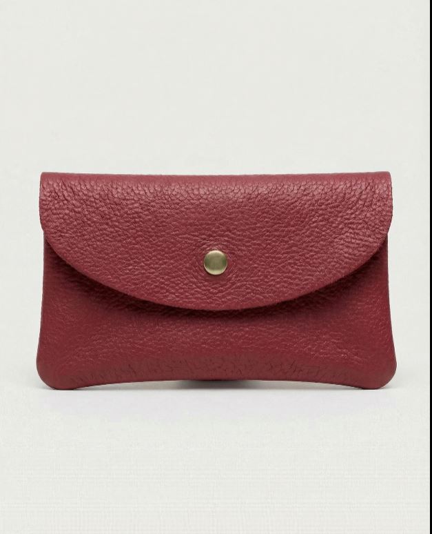 Cranberry pebble leather wallet collection featuring Mini Coin Wallet, Coin Wallet, and Cellphone Wallet in genuine leather, made in Italy.