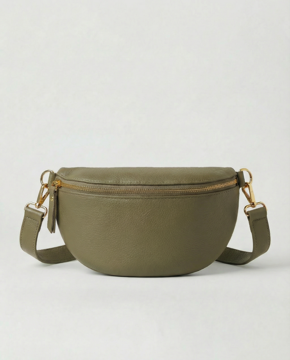 Olive pebble leather fanny bag with adjustable strap and compact, hands‑free design.
