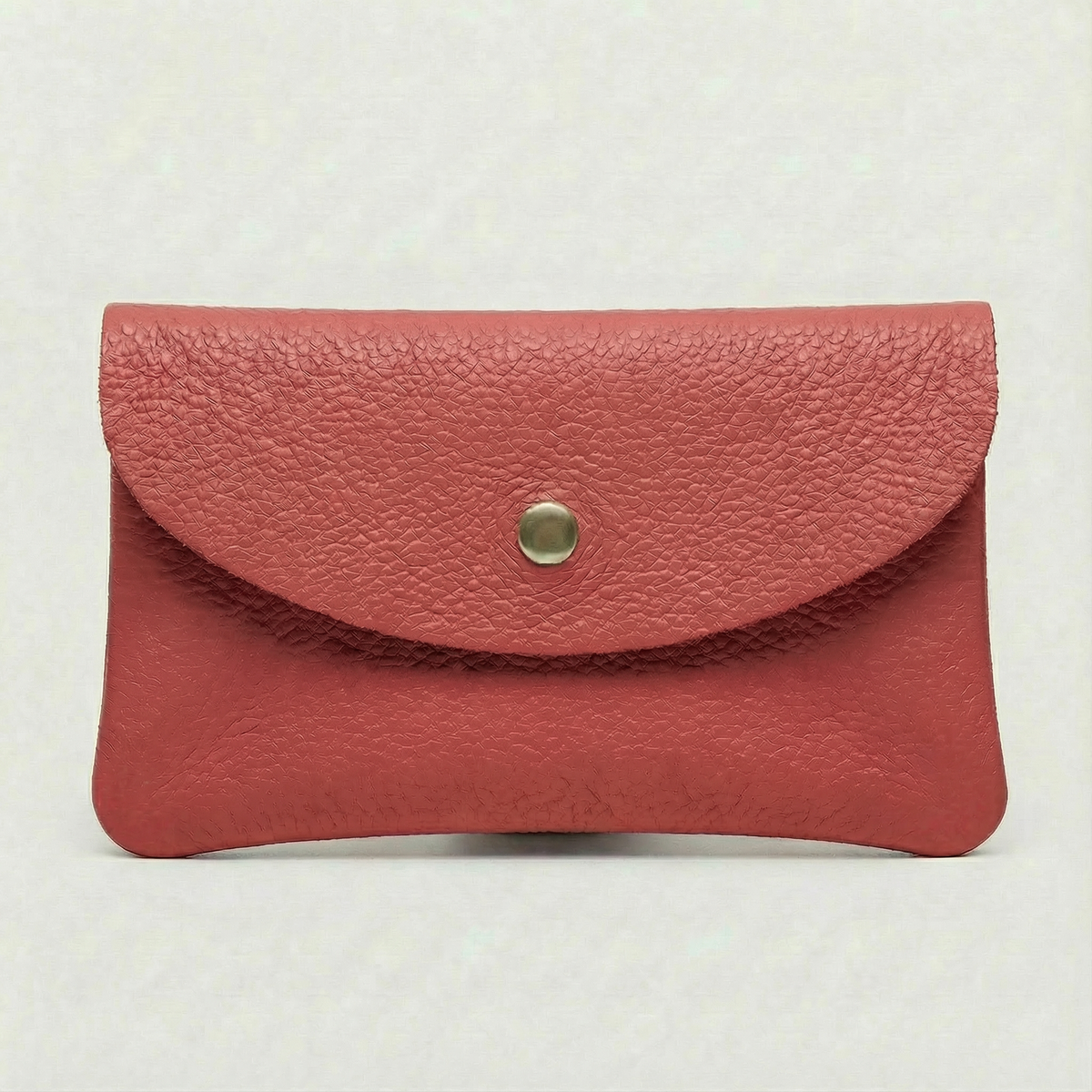 Flamingo pebble leather wallet collection featuring Mini Coin Wallet, Coin Wallet, and Cellphone Wallet in genuine leather, made in Italy.