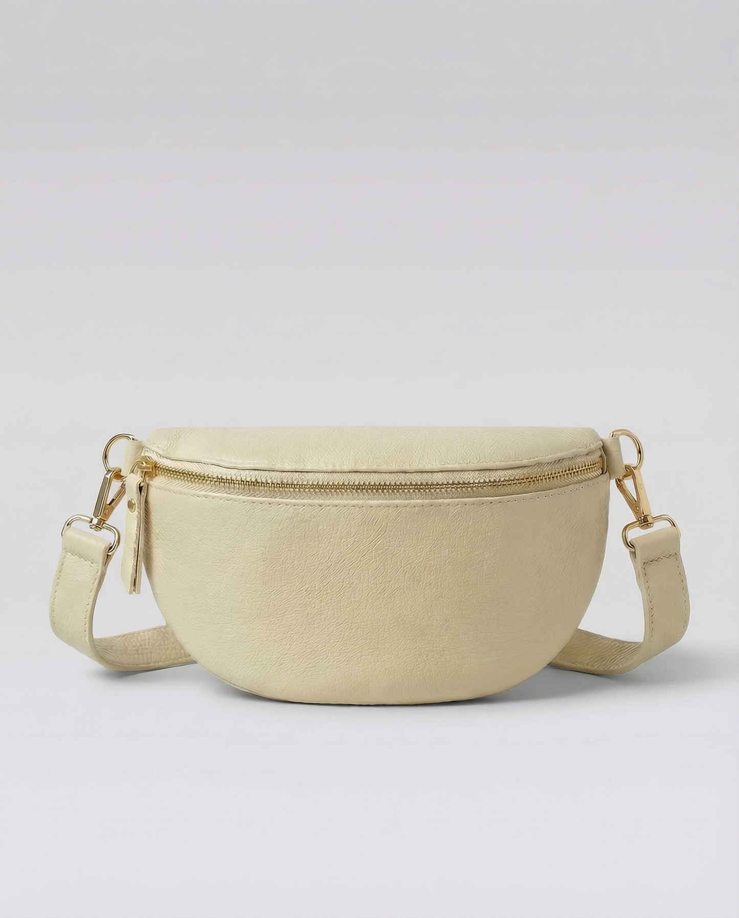 Ivory pebble leather fanny bag with adjustable strap and compact, hands‑free design.