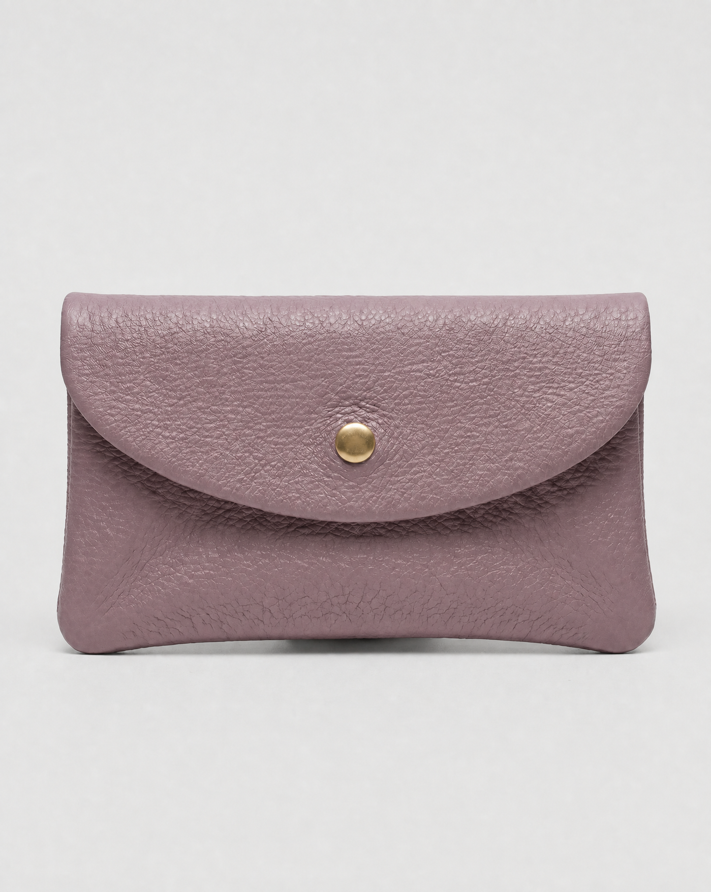 Light Mauve pebble leather coin wallet with snap closure, minimalist Italian design, compact and elegant everyday accessory.