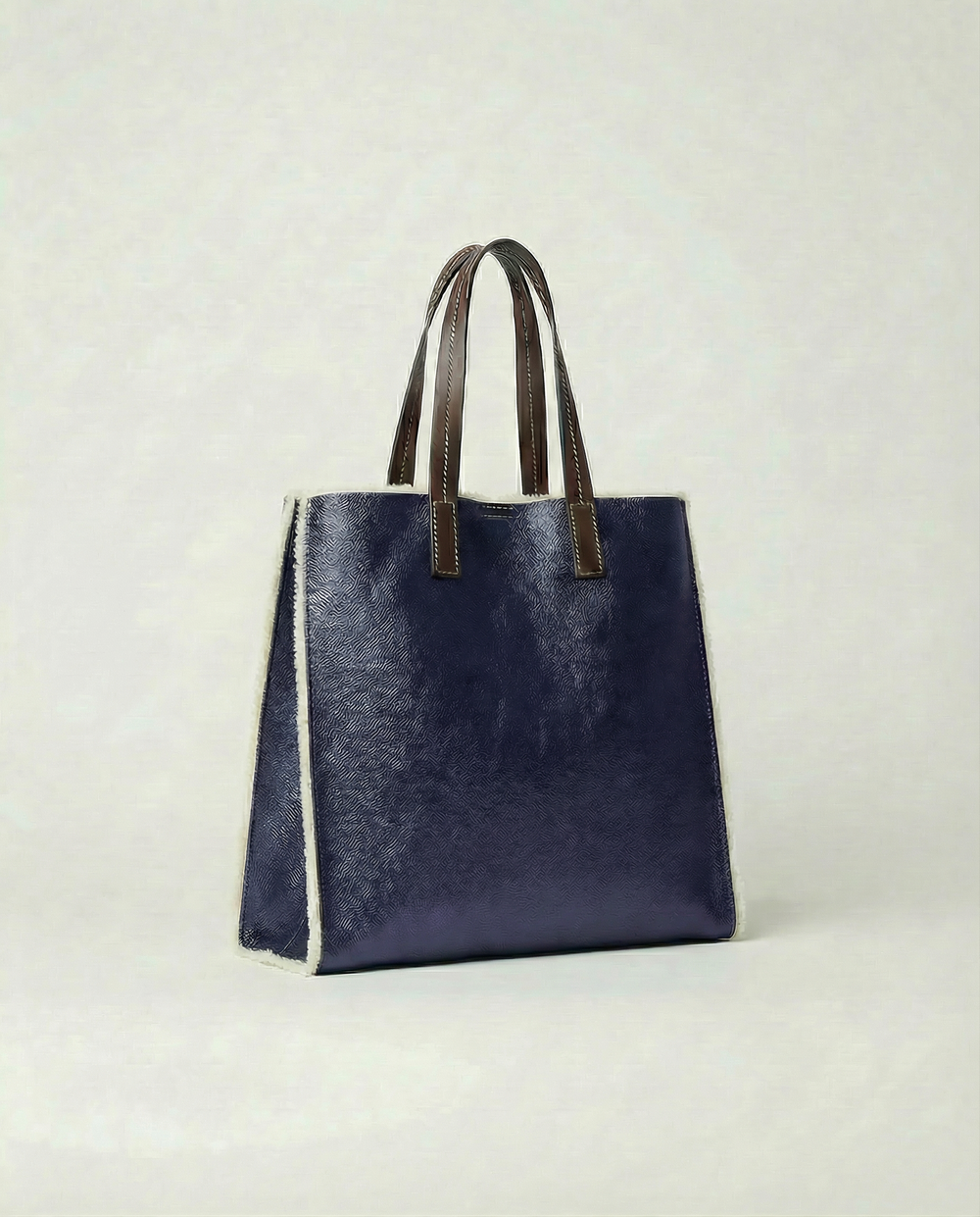 Metallic Indigo leather Paris tote bag available in Paris Tote and Mini Paris Tote sizes.