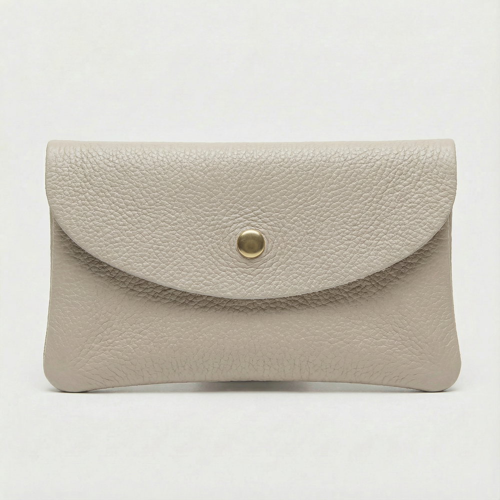 Platinum pebble leather wallet collection featuring Mini Coin Wallet, Coin Wallet, and Cellphone Wallet in genuine leather, made in Italy.