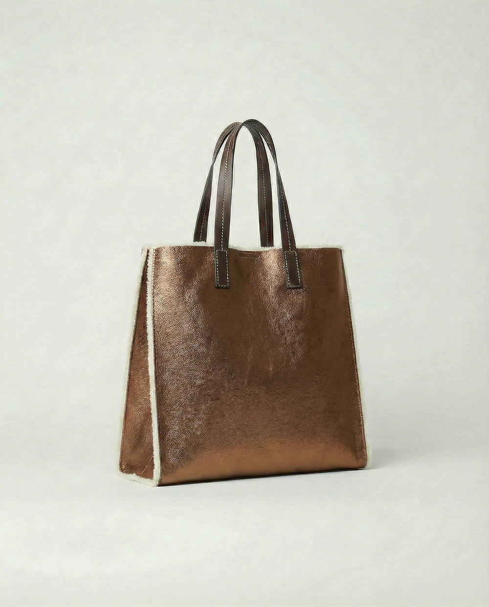 Metallic bronze leather Paris tote bag available in Paris Tote and Mini Paris Tote sizes.