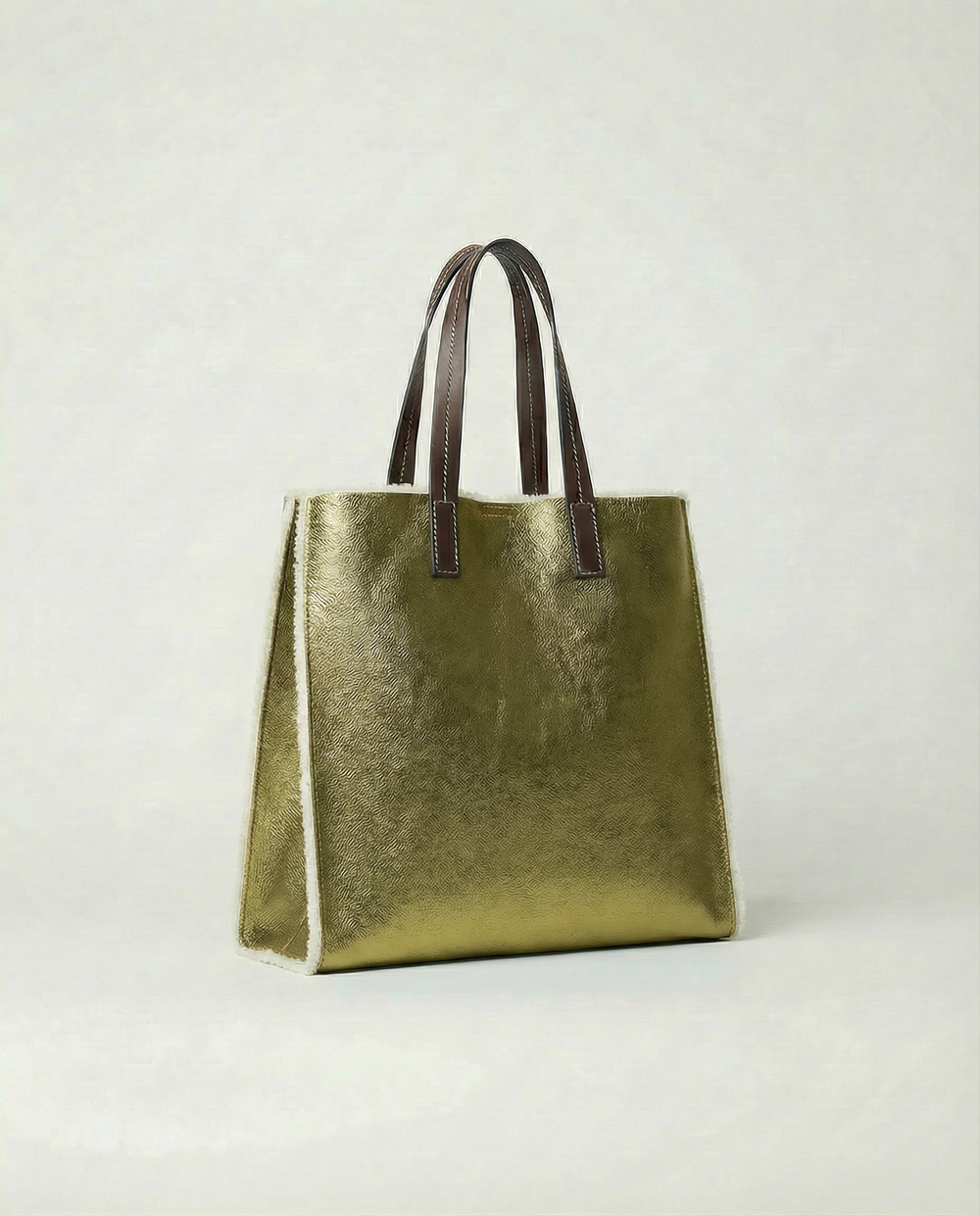 Metallic pistachio leather Paris tote bag available in Paris Tote and Mini Paris Tote sizes.