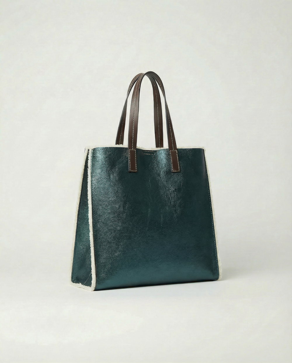 Metallic teal leather Paris tote bag available in Paris Tote and Mini Paris Tote sizes.