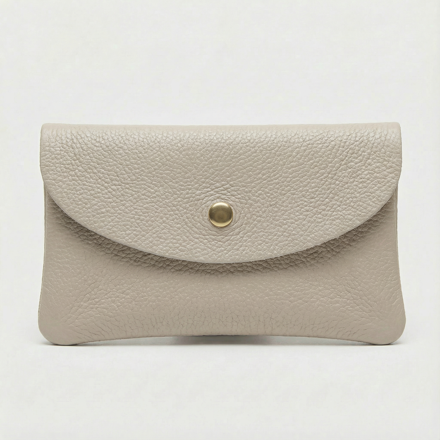 Platinum pebble leather coin wallet with snap closure, minimalist Italian design, compact and elegant everyday accessory.
