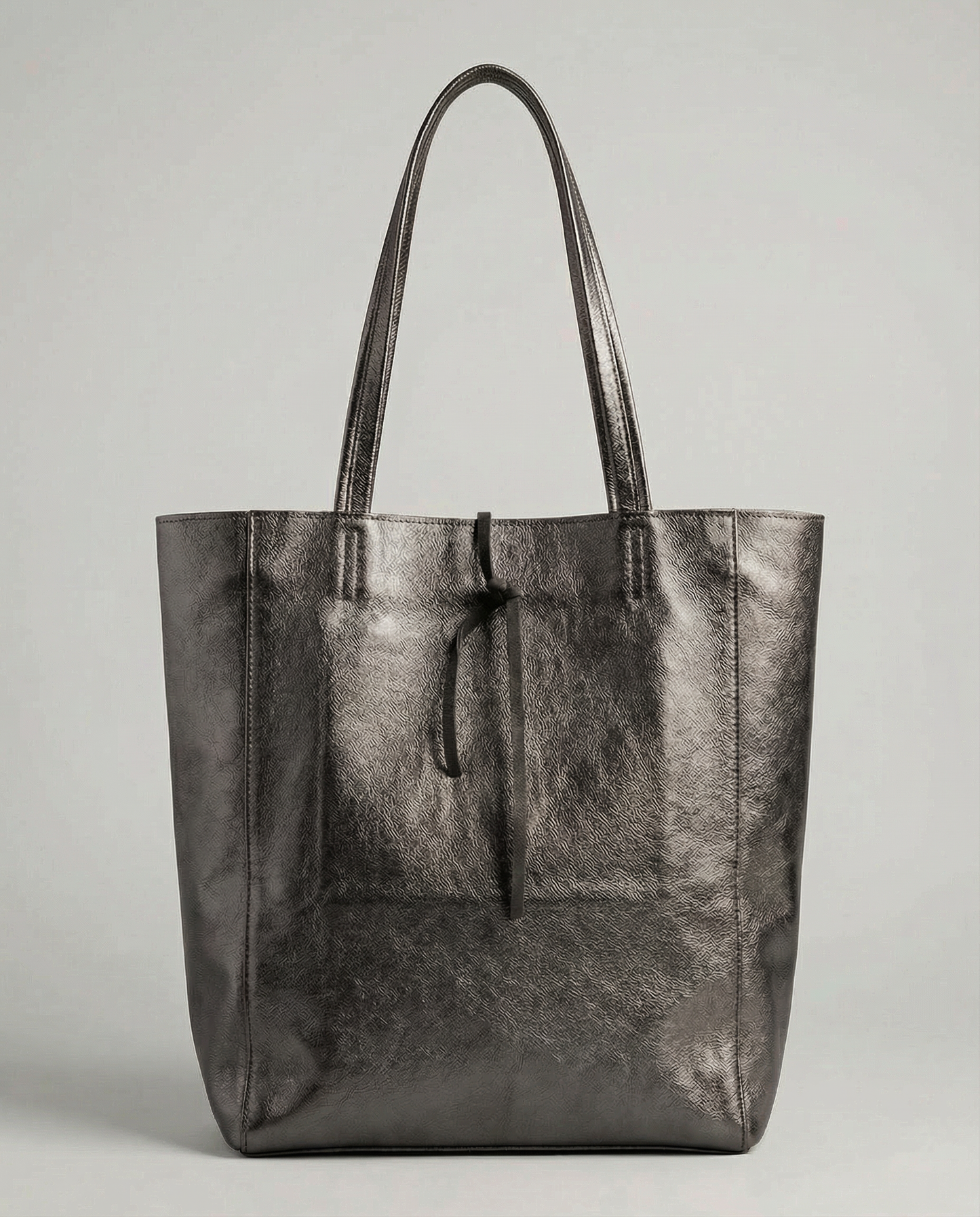Pewter metallic leather tote bag available in Tote Bag and Mini Tote sizes.