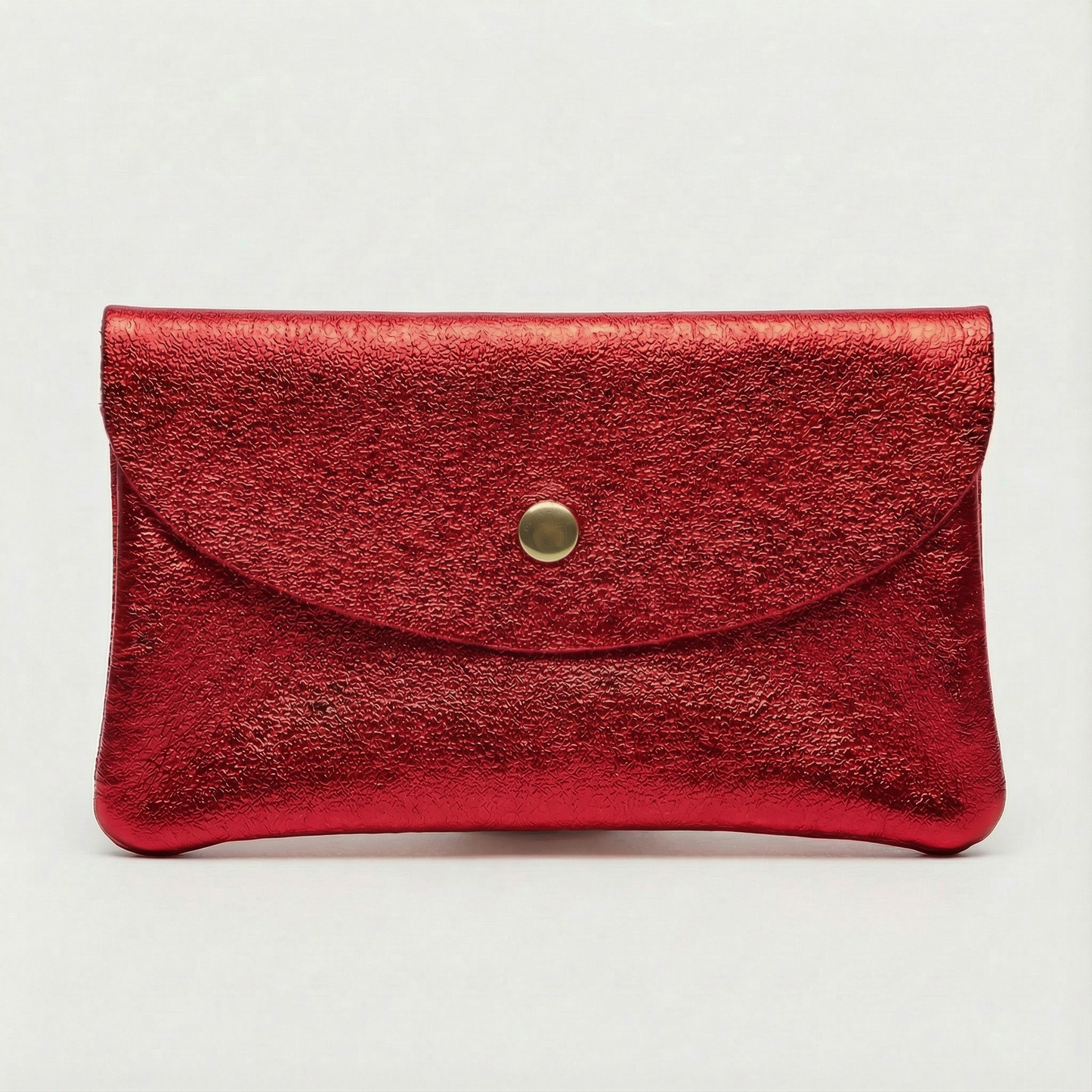 Red metallic leather coin wallet with textured finish, snap closure, compact Italian‑made design, stylish everyday accessory
