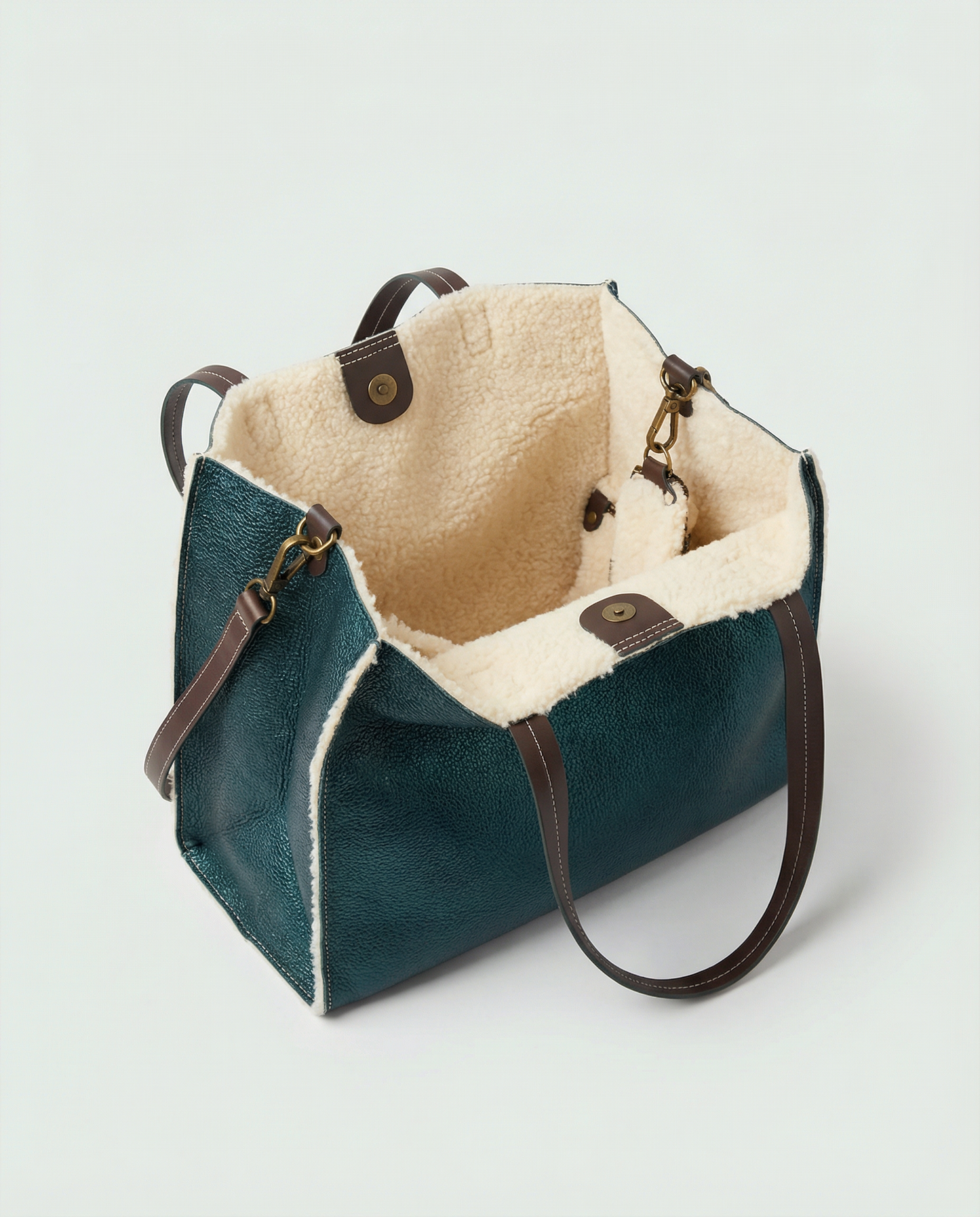 Metallic teal leather Paris tote bag available in Paris Tote and Mini Paris Tote sizes.