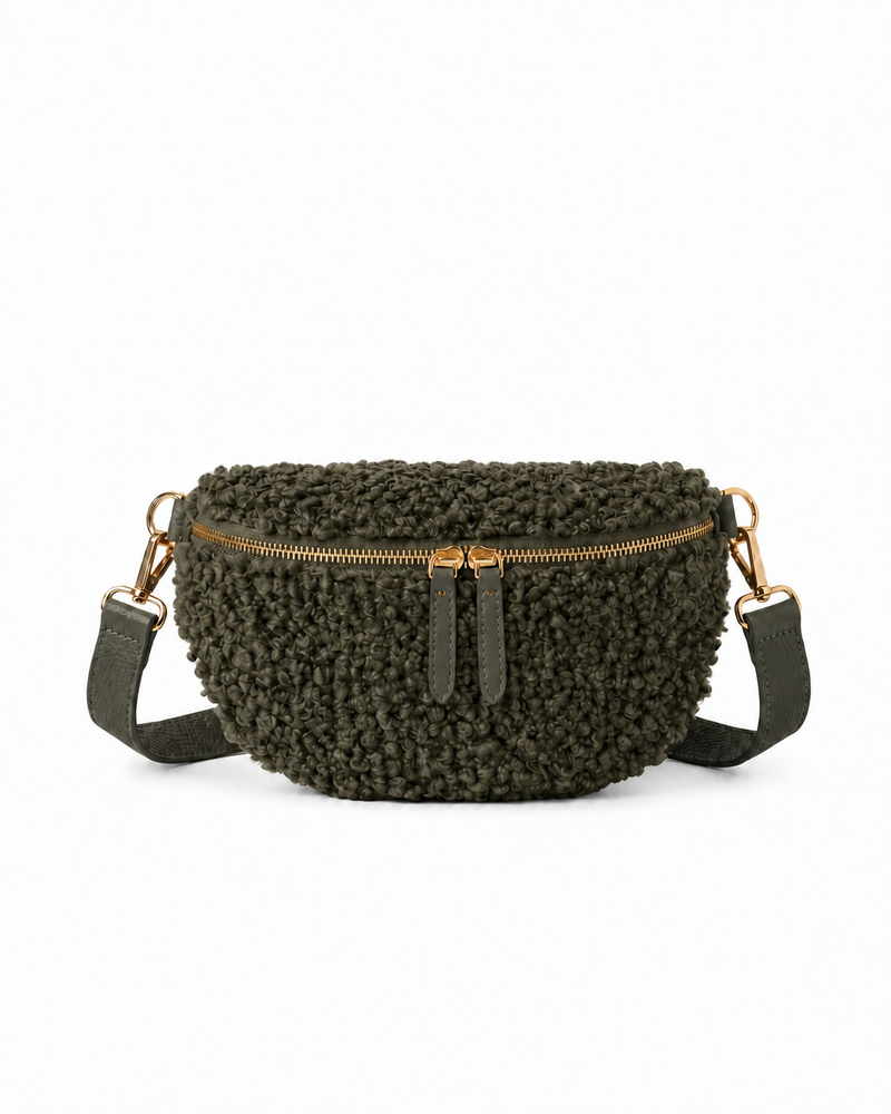 Stylish olive teddy fabric and leather fanny bag with an adjustable strap.