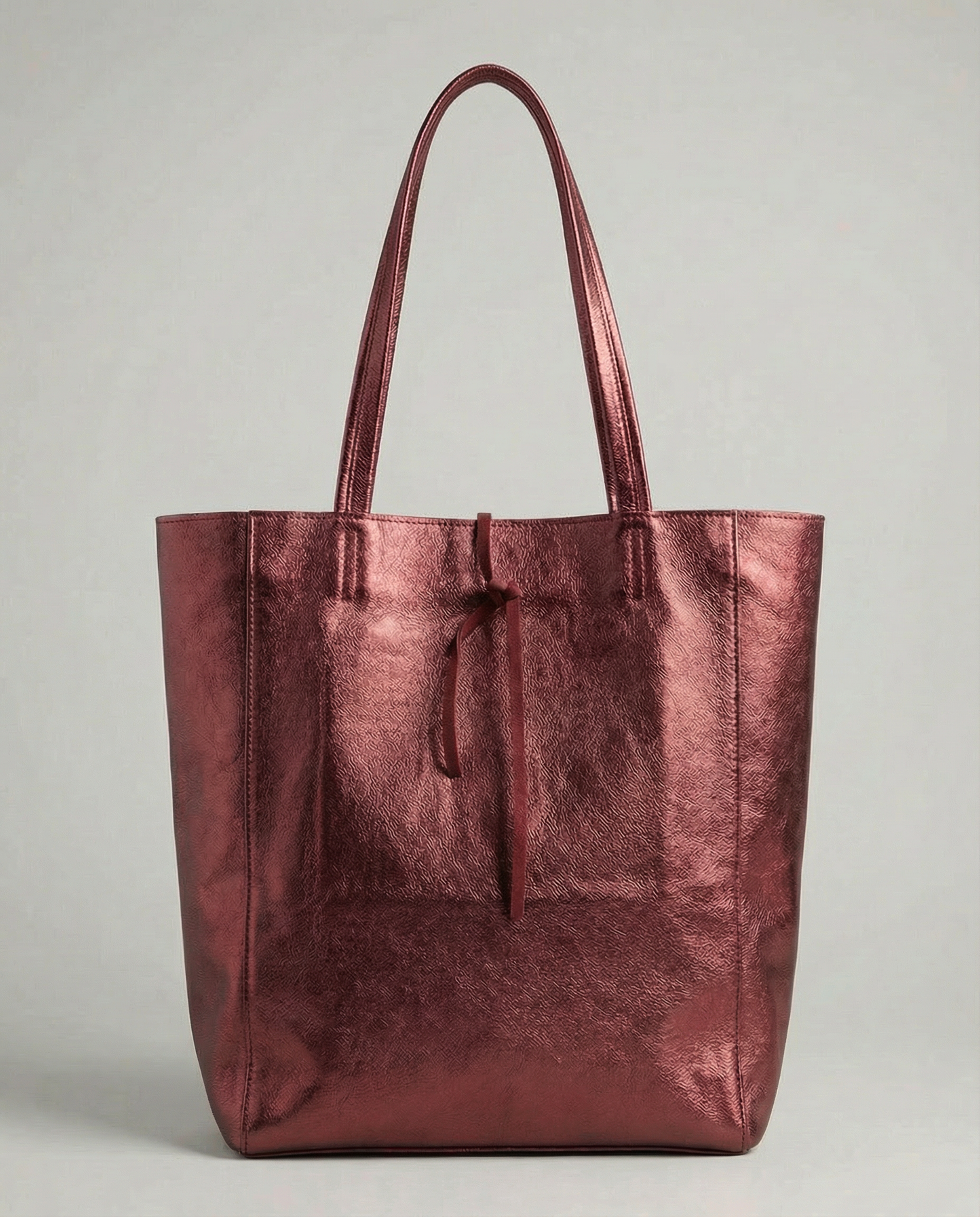 Cranberry metallic leather tote bag available in Tote Bag and Mini Tote sizes.