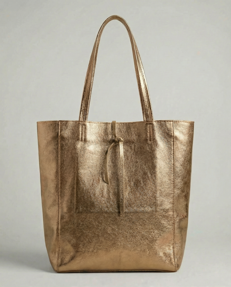 Antique Gold metallic leather tote bag available in Tote Bag and Mini Tote sizes.
