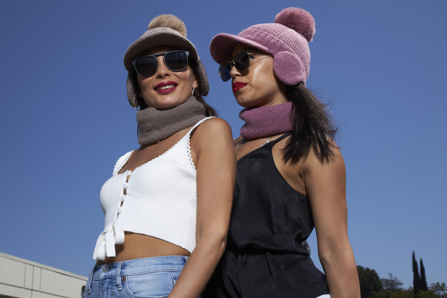 Two women with sunglasses wearing Tourance Oprah collection chiara