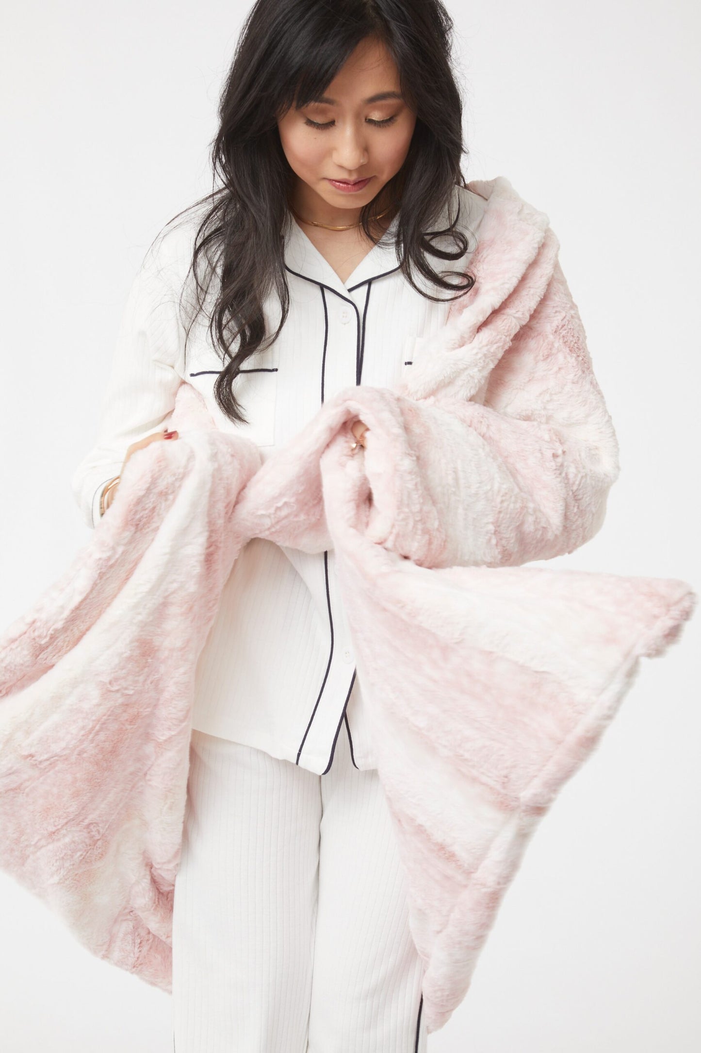 Front view woman wearing with Siberian Leopard Cream and Blush Throw