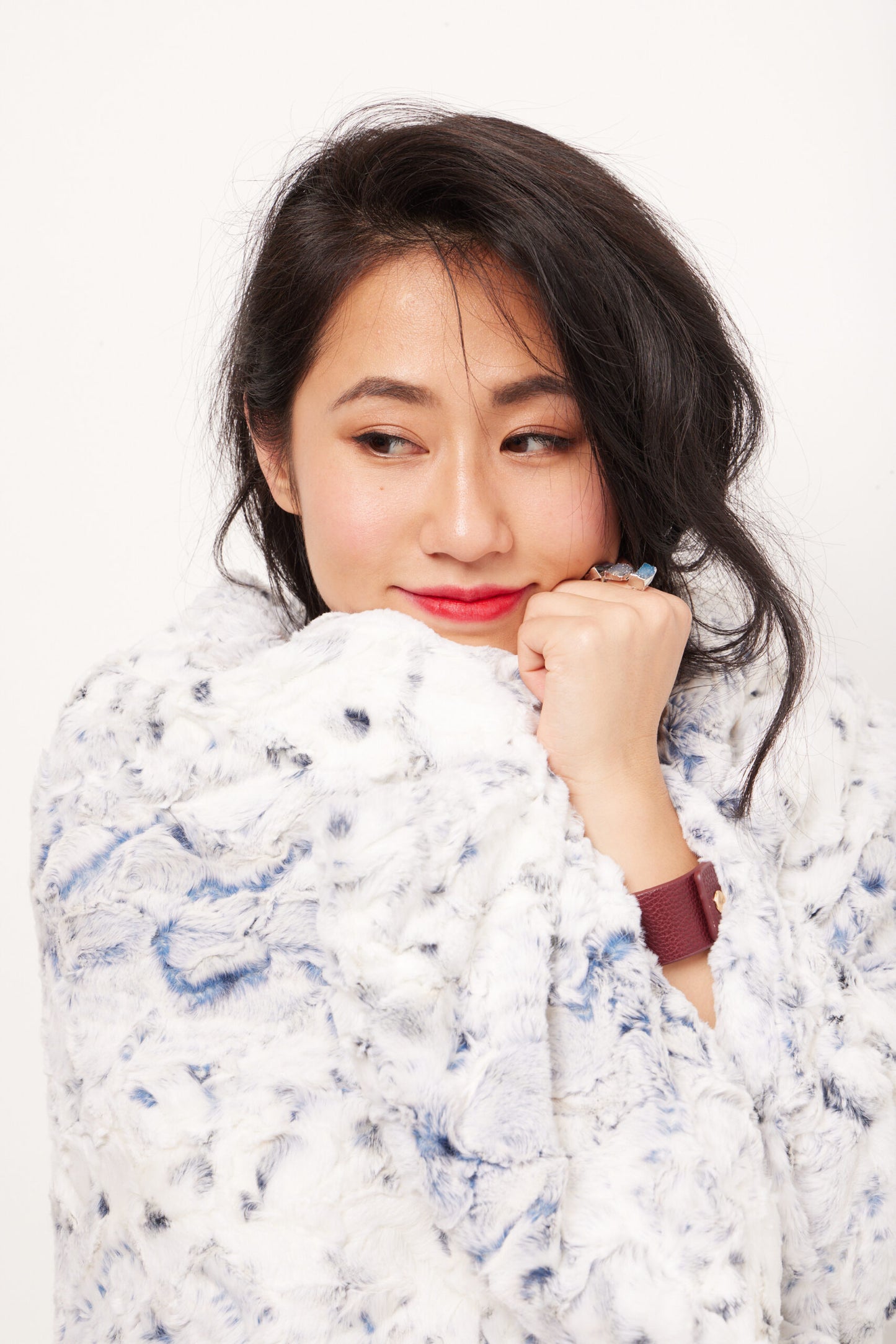 Woman wrapped wearing Throw – Rendevous Navy and Cream