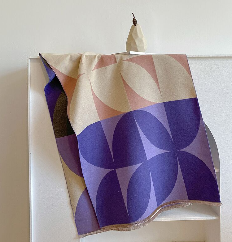 Decorative wrap with geometric pattern on a white surface