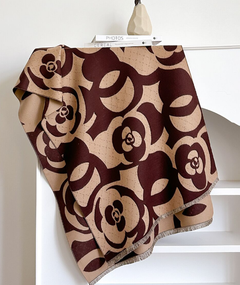 Patterned wrap over a chair with a white background, view 2