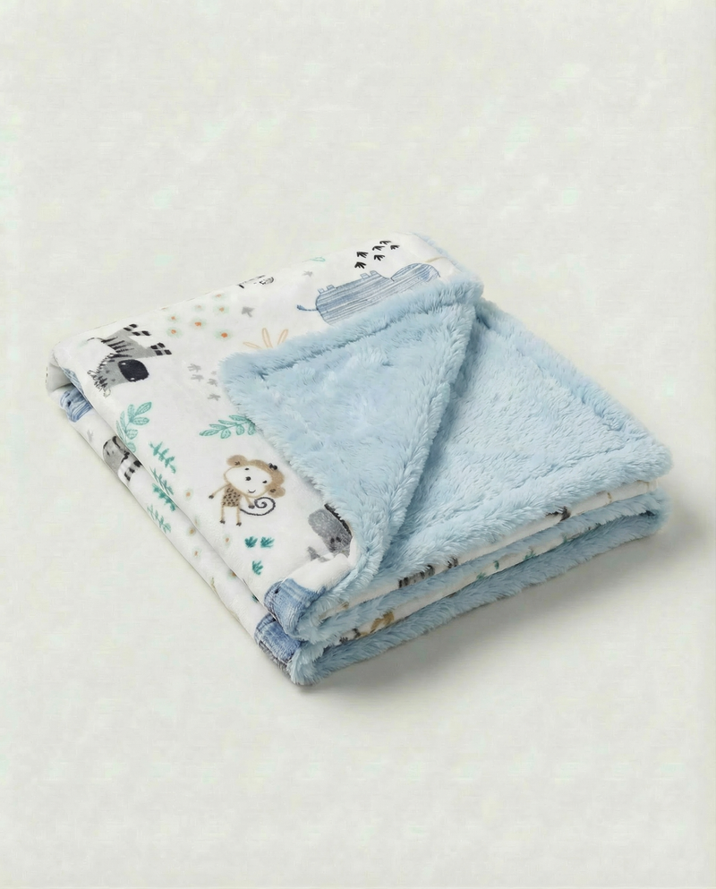 Soft baby blanket with adorable elephant and animal friends print and plush backing, perfect for newborn snuggles.