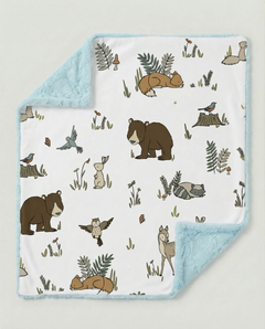 Baby blanket with forest animal pattern on a light gray background, view 2