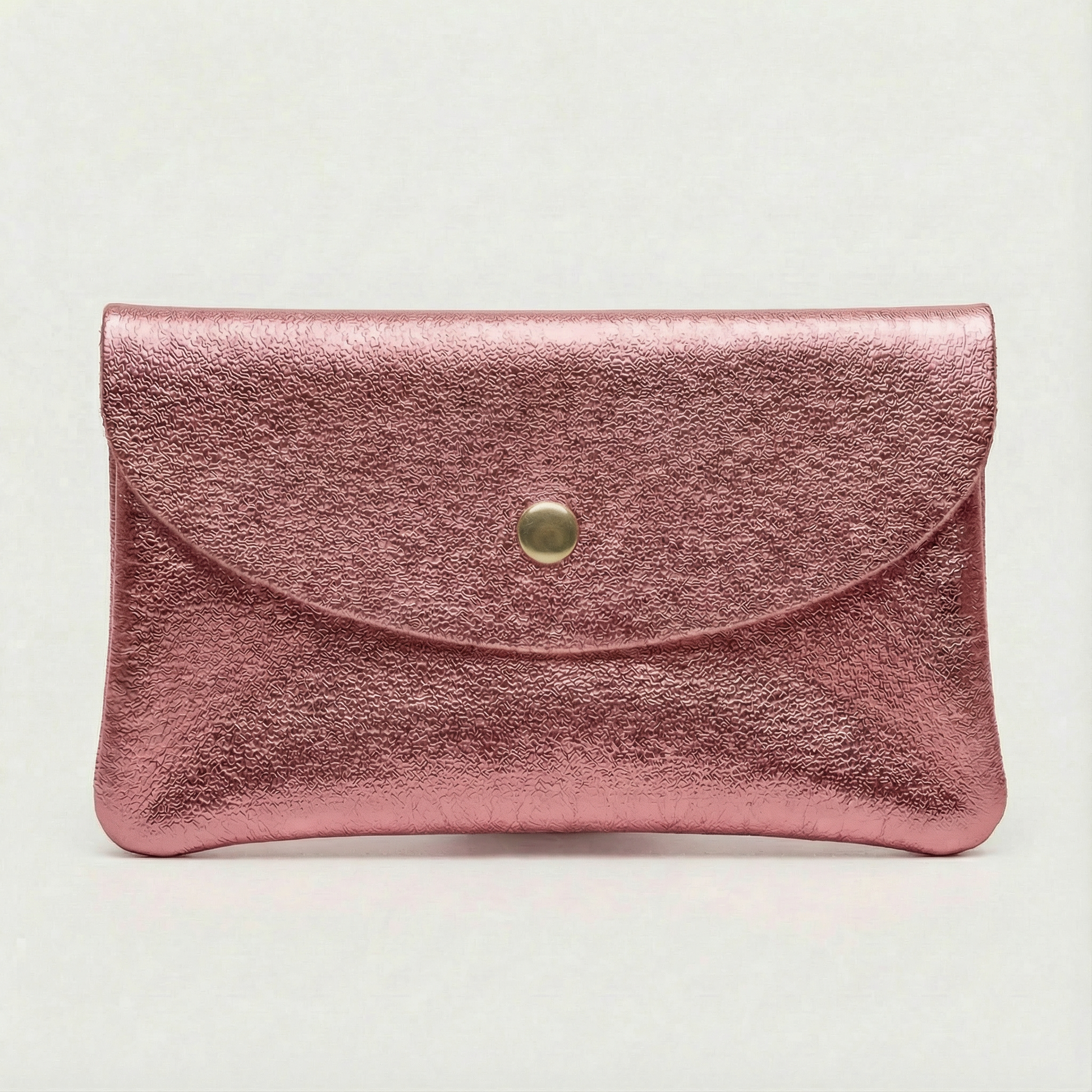 Mini coin wallet in Barbie pink metallic leather with snap closure, compact Italian‑made design for coins and small essentials