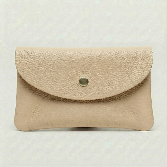 Beige pebble leather wallet collection featuring Mini Coin Wallet, Coin Wallet, and Cellphone Wallet in genuine leather, made in Italy.