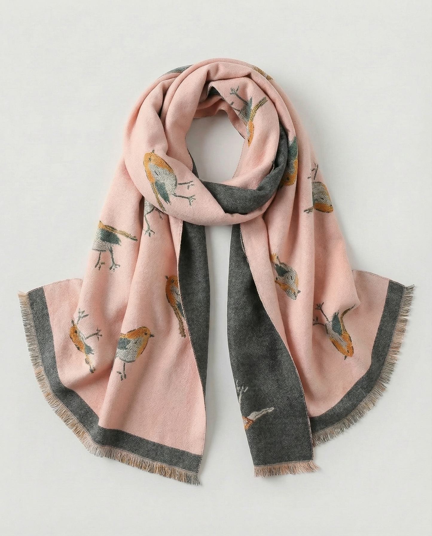 Pink wrap with bird pattern on a light gray background
