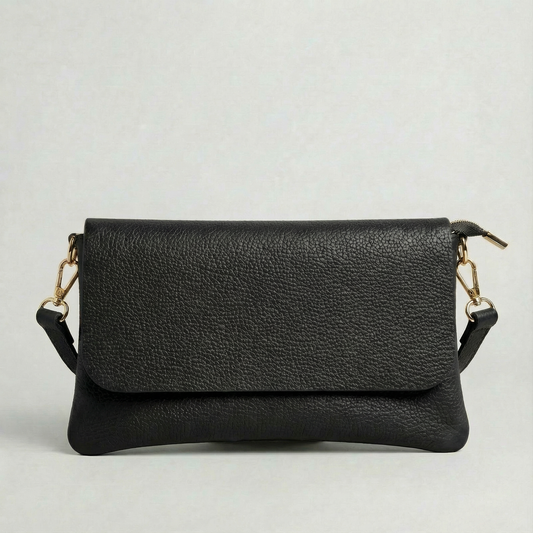 Black pebble leather crossbody bag with a matching color adjustable strap, displayed on a light gray background.