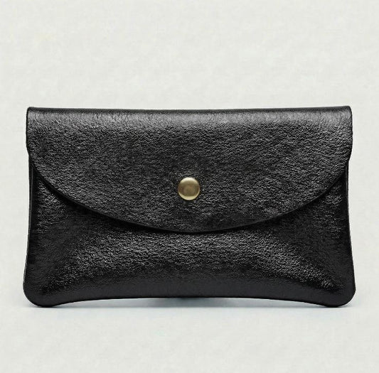 Metallic Black wallet with a gold button on a light gray background
