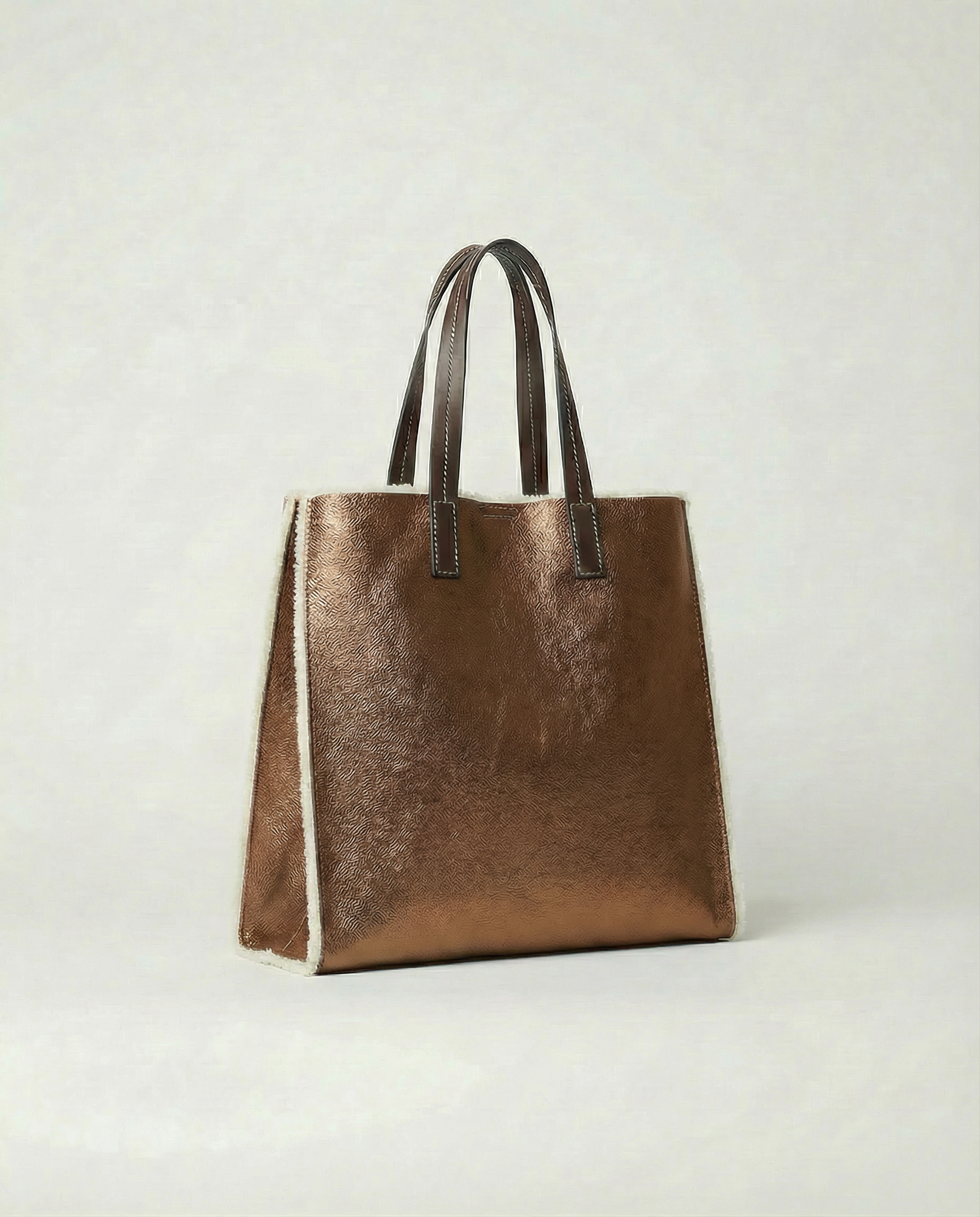 Metallic bronze leather Paris tote bag available in Paris Tote and Mini Paris Tote sizes.