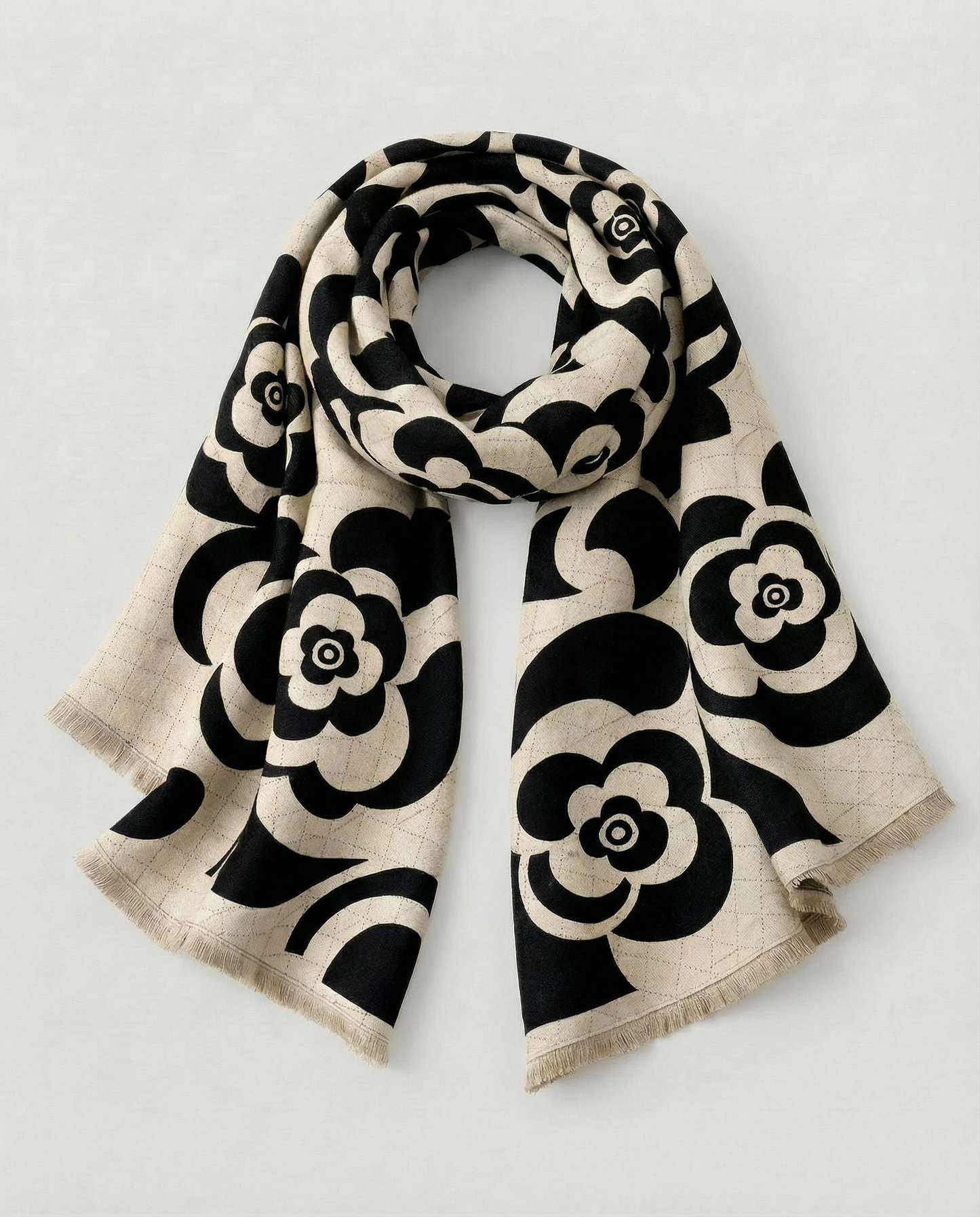 Black and white floral patterned wrap on a light gray background
