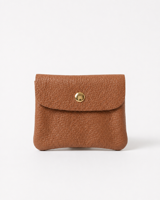 Caramel pebble leather mini coin wallet with snap closure, compact Italian‑made design for coins and small essentials
