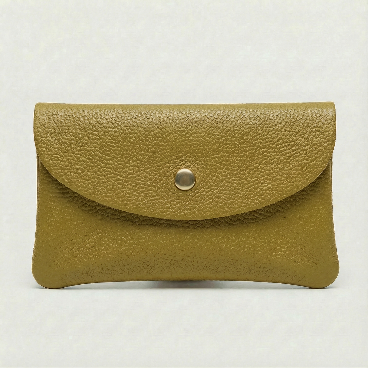 Chartreuse pebble leather wallet collection featuring Mini Coin Wallet, Coin Wallet, and Cellphone Wallet in genuine leather, made in Italy.