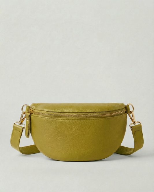 Chartreuse pebble leather fanny bag with adjustable strap and compact, hands‑free design.