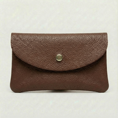 Chocolate pebble leather wallet collection featuring Mini Coin Wallet, Coin Wallet, and Cellphone Wallet in genuine leather, made in Italy., view 1