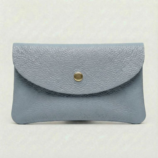 Corn Blue color leather cellphone wallet with a gold button on a white background.