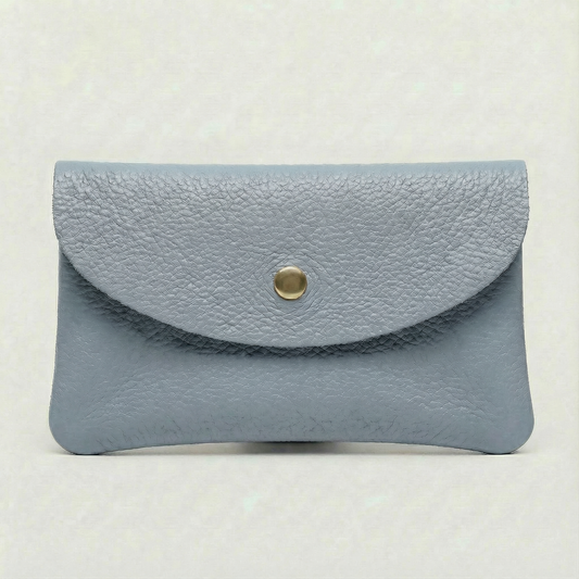 Corn Blue pebble leather mini coin wallet with snap closure, compact Italian‑made design for coins and small essentials
