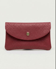 Cranberry pebble leather wallet collection featuring Mini Coin Wallet, Coin Wallet, and Cellphone Wallet in genuine leather, made in Italy., view 1