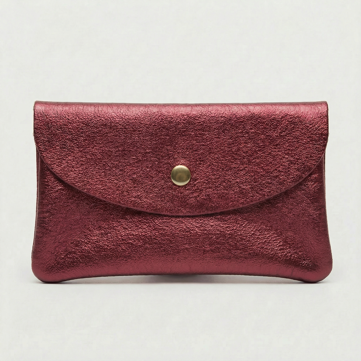 Mini coin wallet in cranberry metallic leather with snap closure, compact Italian‑made design for coins and small essentials