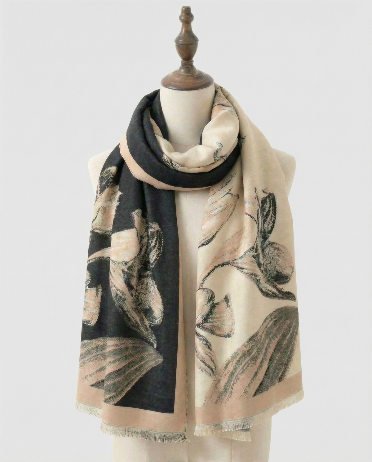 Wrap with floral pattern draped over a mannequin on a light gray background