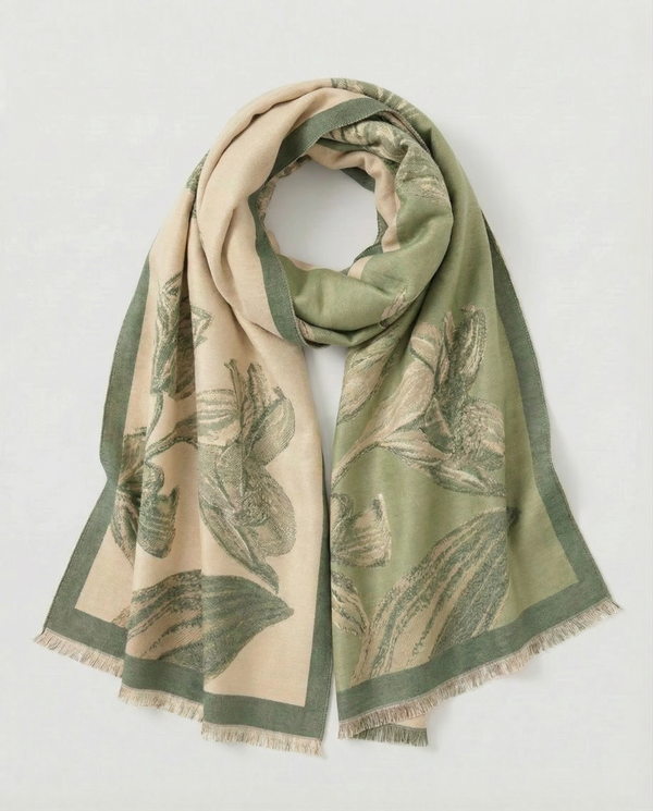 Sage green and beige wrap with dandelion pattern on a white background
