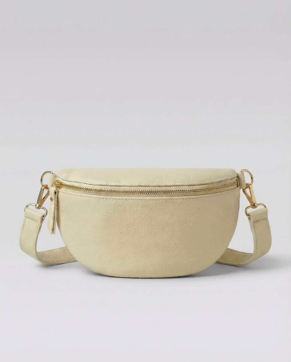 Ivory pebble leather fanny bag with adjustable strap and compact, hands‑free design.
